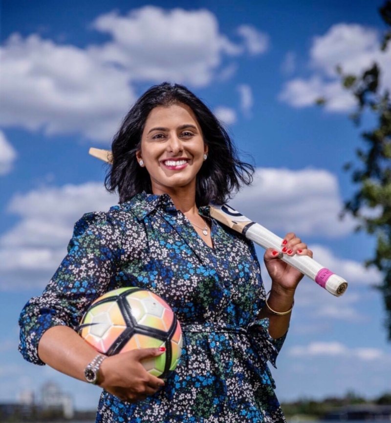 Dr Aish Ravi posing as a women coach - director and owner of Womens Coaching Association